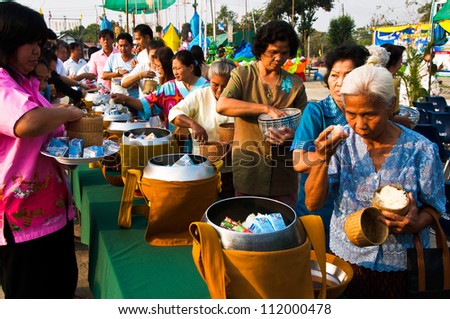 YASOTHON,THAILAND- FEB 17: unidentified people shared food offerings in \