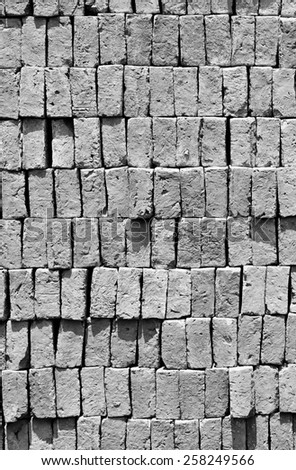 Bricks stacked in piles /Bricks background, Black and white photo.