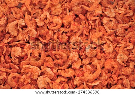 Dried shrimps on asian fish market for background