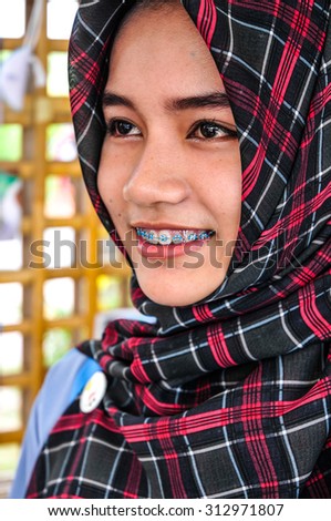 PATTALUNG, THAILAND - AUGUST 30 : Unidentified young thai muslim woman have good mood on August 30, 2015 in August, Pattalung Thailand.