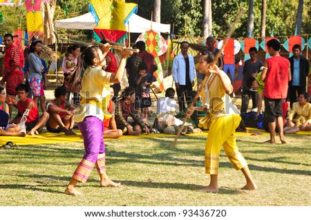 SUKHOTHAI,THAILAND-JAN 17:Unidentified actors perform at the ancient battle and defense play on The King Ramkhamhaeng the Great Day,On Jan 17,2011 in Sukhothai Historical Park.Thailand.