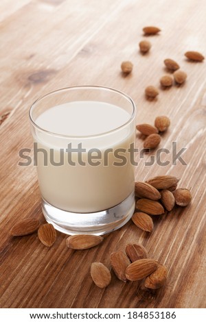 Delicious almond milk. Vegan milk drinking.