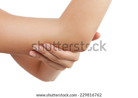 Elbow pain. Beautiful female holding her elbow. Pain concept.