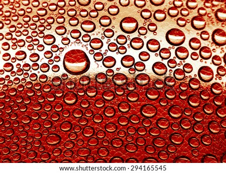 Shape of water drop is overlay with red leather texture, abstract background