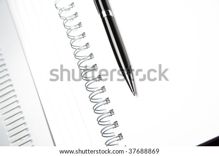 white paper, pencil, Address book with metal spiral