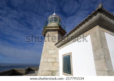 beautiful stone lighthouse in galicia spain