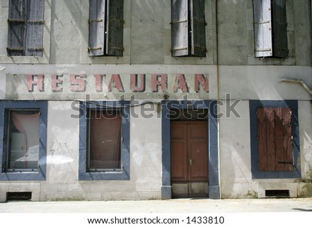 old faded restaurant building in the famous town of carcassonne, southern france