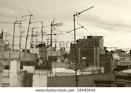 tv aerials and satellites on rooftops in barcelona
