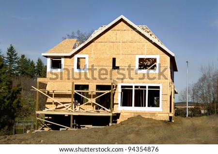 new house in construction . work in progress on urban property..