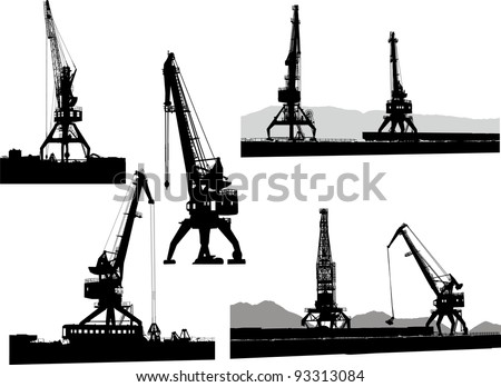 Set of silhouettes of the port cranes on a white background