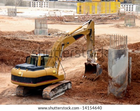 Bulldozer moving earth and digging