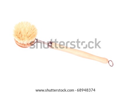 Classic wooden dish-brush isolated against background
