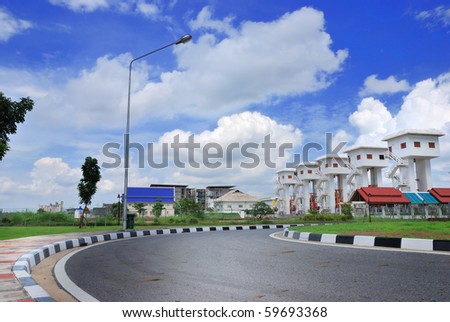 The curve of garden street with brighten sky