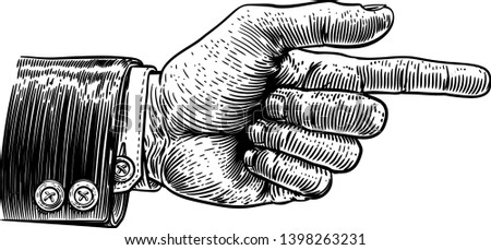 A hand pointing a finger in a direction sign. Wearing a business suit in a vintage antique engraving woodblock or woodcut style.