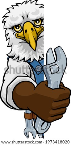 An eagle cartoon animal mascot plumber, mechanic or handyman builder construction maintenance contractor peeking around a sign holding a spanner or wrench