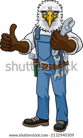 An eagle cartoon animal mascot plumber, mechanic or handyman builder construction maintenance contractor holding a spanner or wrench and giving a thumbs up