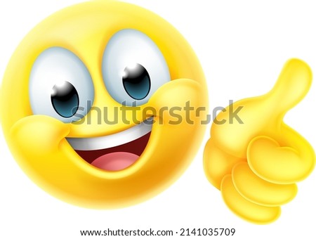 A thumbs up happy emoticon cartoon face icon