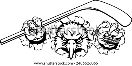 An eagle ice hockey player animal sports mascot holding a hockey stick and puck