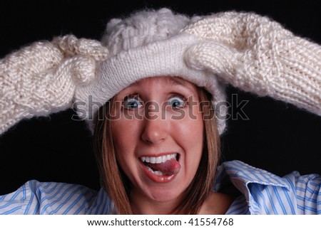 Silly Girl with Mittens and Hat