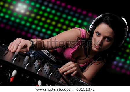 Beautiful DJ Girl Performing with Club Lights in the background