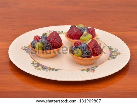 Fresh Homemade Fruit Tart with strawberry blue berry black berry and kiwi
