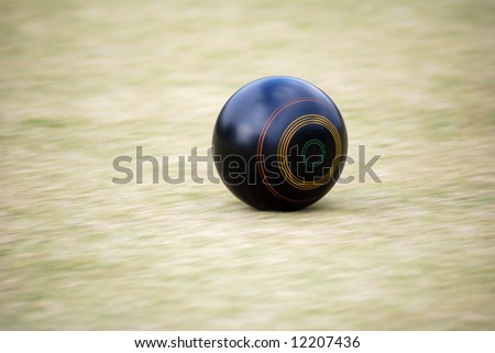 Motion Captured of rolling ball during a Lawn Bowl Game.
