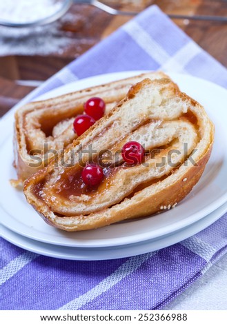 Roll cake with jam and cranberries