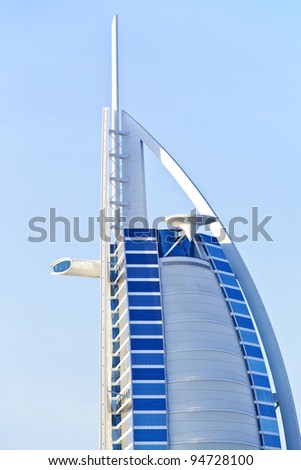 DUBAI, UNITED ARAB EMIRATES -  Burj Al Arab luxury hotel with circle helicopter pad on top of building on JANUARY 2, 2012 in Dubai, UAE. Helipad can be transformed to tennis or golf playground.