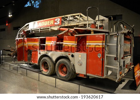 NEW YORK CITY, USA - May 17, 2014: Fire Engine destroyed in attacks on the Twin Towers at the National 9/11 Memorial Museum at Ground Zero in Lower Manhattan.