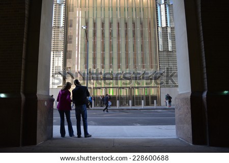 New York City, USA - November 3, 2014: A couple across the street from the newly opened World Trade Center Tower One in New York City.