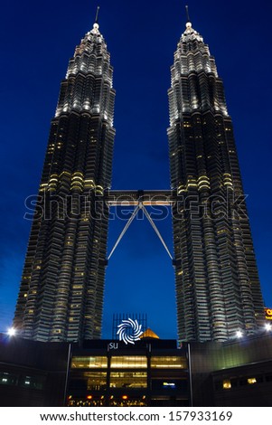 KUALA LUMPUR, MALAYSIA - JULY 09 2013: Twilight view of the Petronas Twin Towers in the Malaysian capital, Kuala Lumpur.  The 452m tall towers are the largest twin structure in the world