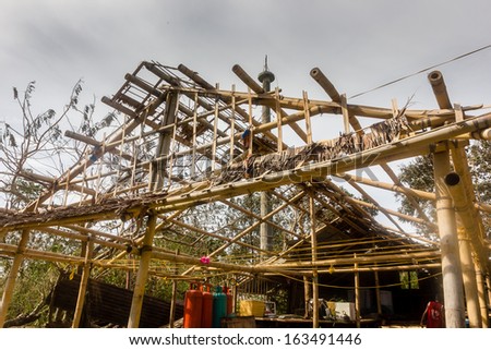 BORACAY, PHILIPPINES - NOVEMBER 9 2013: A building completely stripped off its roof by Super Typhoom Haiyan / Yolanda