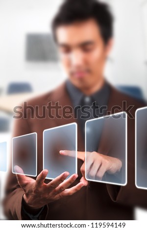 Man pushing touch screen icon