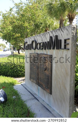 FORT LAUDERDALE, FL, USA - APRIL 7, 2014: Large stone and metal sign welcoming visitors to the Galt Ocean Mile community in North Fort Lauderdale. An historic metal neighborhood sign.