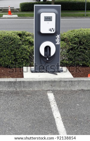 BEAVERTON, OREGON - JUNE 30: Blink electric vehicle charging station across from the city library on June 30, 2011 in Beaverton, Oregon. Some energy is supplied by photovoltaic (solar energy) panels.