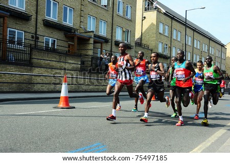 LONDON, UK - APRIL 17, 2011 - Emmanuel Mutai (r) runs with the main group of marathones in the Virgin Maraton April 17 in London