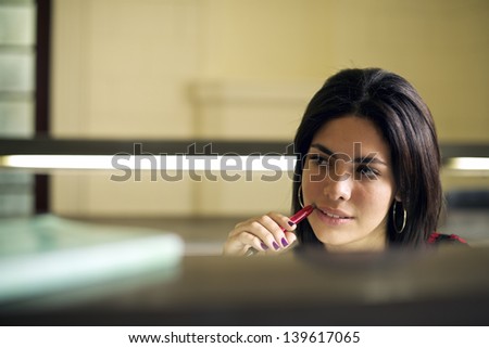 University library and female student, beautiful young woman studying and preparing test in college