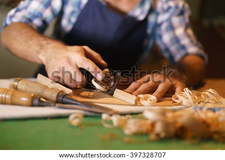 Similar – Image, Stock Photo Instrument maker working with hair for bow