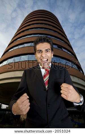 angry businessman screaming like crazy...he is really upset!