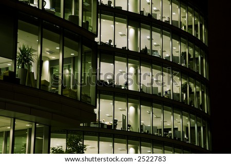 Shot of a corporate office building in the night.