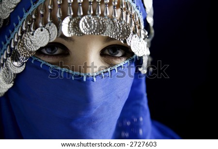 middle eastern culture: belly dancer with traditional veil