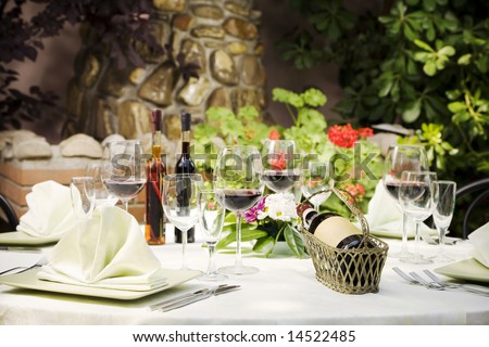 Outdoor restaurant table setting, copy space