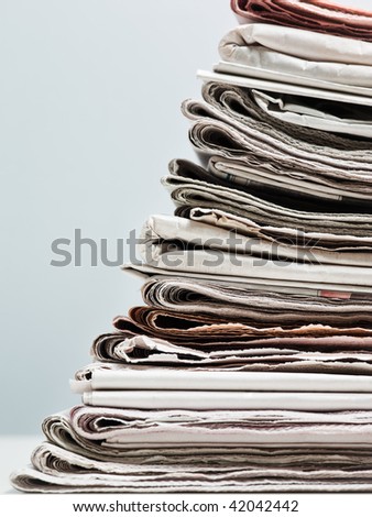 old newspapers in stack. Copy space