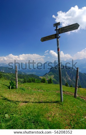 Signpost in the Alps along an Alpine trail