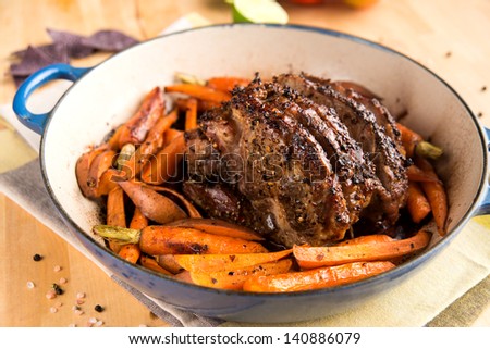 Oven Roasted Pork Shoulder in Pan with Carrots and Sweet Potatoes
