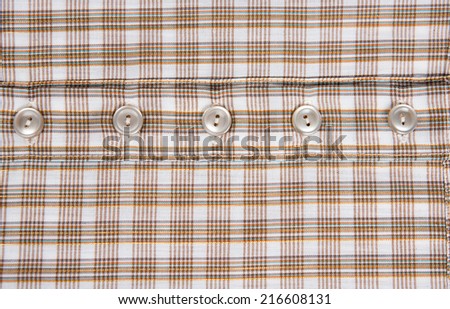 Close up of Beige and Brown Plaid Flannel Shirt