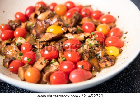 Yellow Chanterelle Mushrooms Cooked in Butter and Wine with Cherry Tomatoes