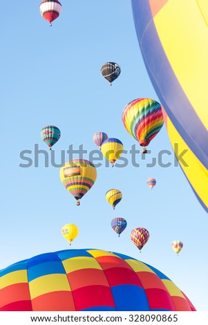 ALBUQUERQUE, NEW MEXICO - OCTOBER 6, 2015: Balloons fly over Albuquerque, New Mexico. International balloon fiesta is the biggest hot air balloon event in the world.