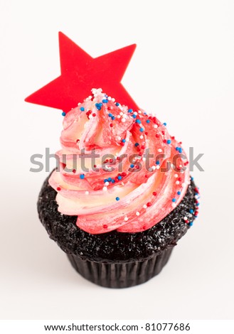 Cute Chocolate Cupcake with Red Frosting and Star Decorated for Independence Day Isolated on White Background