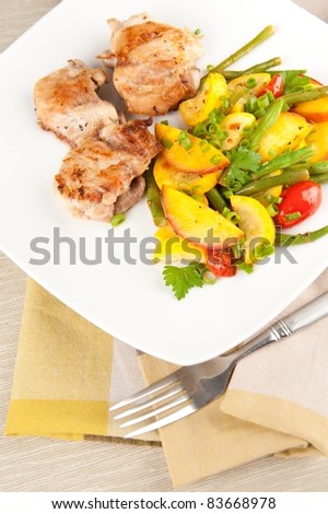 Sauteed Chicken Thighs Served with Cooked Yellow Zucchini, Peaches, Green Beans and Tomatoes